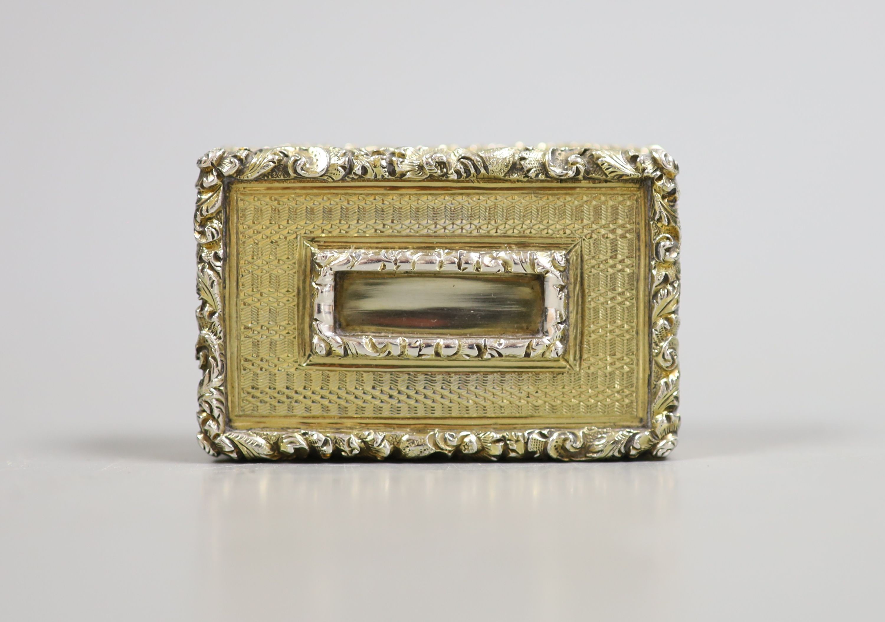 A George IV silver gilt rectangular vinaigrette, Taylor & Perry, Birmingham, 1832?, 42mm.